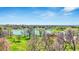 Picturesque lake view showcasing lush greenery and the cityscape in the distance, offering stunning scenery at 480 S Marion Pkwy # 1202, Denver, CO 80209