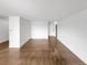 Spacious living room featuring hardwood flooring and a modern design at 480 S Marion Pkwy # 1202, Denver, CO 80209