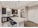 Stylish kitchen featuring a spacious island, stainless steel appliances, and modern cabinetry at 18112 E 104Th Way, Commerce City, CO 80022
