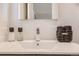 Close up of bright bathroom with a modern vanity and a decorative faucet at 4441 N Meade St, Denver, CO 80211