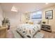 Basement bedroom with modern decor and natural light at 4441 N Meade St, Denver, CO 80211