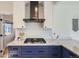 Modern kitchen showcases granite countertops, stainless appliances, and a stylish range hood at 4441 N Meade St, Denver, CO 80211
