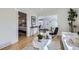 Bright open-concept living room adjacent to the Primary bedroom and tiled mudroom at 4441 N Meade St, Denver, CO 80211