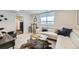 Bright living area with stylish furnishings, bar, and neutral tones at 4441 N Meade St, Denver, CO 80211