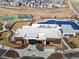 Aerial shot highlighting the community center and various recreational facilities at 5072 Lake Port Ave, Firestone, CO 80504