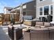 A covered hot tub and outdoor seating are featured in the backyard at 5072 Lake Port Ave, Firestone, CO 80504