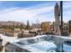 An amazing backyard features a hot tub, patio seating and garden at 5072 Lake Port Ave, Firestone, CO 80504