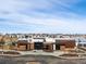 Exterior of the community center in a Primary-planned community showcases modern architecture at 5072 Lake Port Ave, Firestone, CO 80504