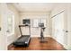 Bright exercise room with a treadmill and stationary bike, perfect for staying active at 3864 Osceola St, Denver, CO 80212