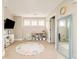 Spacious playroom featuring a rug, large mirror, and toy kitchen at 3864 Osceola St, Denver, CO 80212