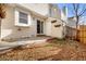 Small back patio area with access from sliding glass door at 17286 E Ford Dr, Aurora, CO 80017