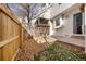 Small backyard with wooden fence and patio at 17286 E Ford Dr, Aurora, CO 80017