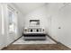 Bright bedroom with large window and carpet at 17286 E Ford Dr, Aurora, CO 80017