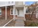 Front entrance of townhome with steps and small porch at 17286 E Ford Dr, Aurora, CO 80017