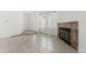 Living room with fireplace and tiled floors at 17286 E Ford Dr, Aurora, CO 80017