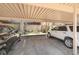 Designated carport parking featuring mature trees and well-maintained landscape at 7995 E Mississippi Ave # A4, Denver, CO 80247