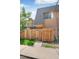 Exterior shot features a well-maintained yard and unique architectural design at 7995 E Mississippi Ave # A4, Denver, CO 80247