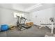 Well-equipped gym features treadmill, elliptical, and bench press at 7995 E Mississippi Ave # A4, Denver, CO 80247