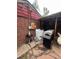 Backyard featuring a grill, patio, and shed at 1900 Quebec St, Denver, CO 80220
