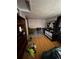 A spacious bedroom with hardwood floors and a closet at 1900 Quebec St, Denver, CO 80220