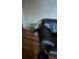 Cozy living area with hardwood floors and a plush leather sofa at 1900 Quebec St, Denver, CO 80220