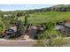 Spacious home with a large yard, nestled in a serene neighborhood with lush green surroundings at 14418 W Bayaud Ave, Golden, CO 80401