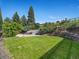 View of a well-maintained lawn with professional rock and landscape accents at 14418 W Bayaud Ave, Golden, CO 80401