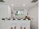 The bar has black and white tile countertop at 14418 W Bayaud Ave, Golden, CO 80401