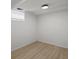 Bedroom featuring laminate flooring and natural light at 14418 W Bayaud Ave, Golden, CO 80401
