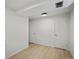 Bedroom with modern flooring and access to closets and other rooms at 14418 W Bayaud Ave, Golden, CO 80401