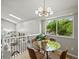 Upstairs dining area with natural lighting and stairway views at 14418 W Bayaud Ave, Golden, CO 80401