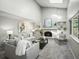 Cozy living room featuring a white brick fireplace and open layout at 14418 W Bayaud Ave, Golden, CO 80401