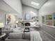 Living room featuring a white brick fireplace with plenty of natural light at 14418 W Bayaud Ave, Golden, CO 80401