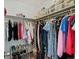 Spacious walk-in closet with clothing racks and shelving for optimal organization at 14418 W Bayaud Ave, Golden, CO 80401