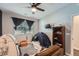 bedroom features a tent play area, comfortable seating and modern storage solutions at 1831 S Dunkirk St # 103, Aurora, CO 80017