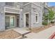 Exterior view of the building featuring walkways and building entrances at 1831 S Dunkirk St # 103, Aurora, CO 80017