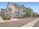 Attractive apartment complex featuring a blend of siding and stone accents and staircase entry at 1831 S Dunkirk St # 103, Aurora, CO 80017