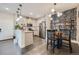 Spacious kitchen featuring stainless steel appliances, modern countertops and a stylish breakfast nook at 1831 S Dunkirk St # 103, Aurora, CO 80017