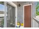 Exterior patio view featuring a sliding door and exterior door at 1831 S Dunkirk St # 103, Aurora, CO 80017