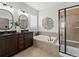 Luxurious bathroom with soaking tub and walk-in shower at 6918 S Riverwood Way, Aurora, CO 80016