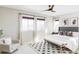 Main bedroom with plush carpet, large windows and ceiling fan at 6918 S Riverwood Way, Aurora, CO 80016