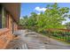 A large, inviting wooden deck with a railing, perfect for outdoor relaxation and scenic views at 7077 Dudley Dr, Arvada, CO 80004