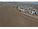 Aerial view of a suburban development, displaying tidy homes and a neat landscape at 15076 W 93Rd Ave, Arvada, CO 80007