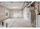 Unfinished basement with concrete floors and window at 15076 W 93Rd Ave, Arvada, CO 80007