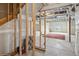 An unfinished basement with wood framing and concrete floor at 15076 W 93Rd Ave, Arvada, CO 80007