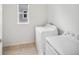 A laundry room with a washer and dryer at 15076 W 93Rd Ave, Arvada, CO 80007