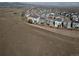 Aerial shot displays a well-planned community with neatly arranged homes and open spaces at 15076 W 93Rd Ave, Arvada, CO 80007