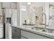 Modern kitchen with granite countertops, stainless steel appliances, and ample storage at 1356 S Boston Ct # B, Denver, CO 80247