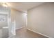 Upstairs hallway with neutral walls and carpet at 4821 N Silverlace Dr, Castle Rock, CO 80109