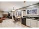 Kitchen with granite countertops and white cabinets at 4821 N Silverlace Dr, Castle Rock, CO 80109